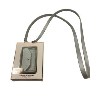 Phone pocket with removable strap turns your cell phone into a purse